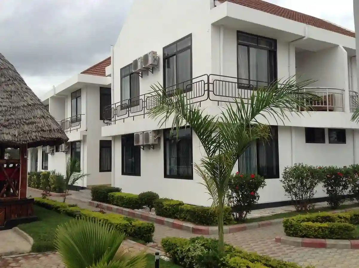 Mikumi National Park Accommodation: A view of Vamosi Hotel surrounded by lush greenery.