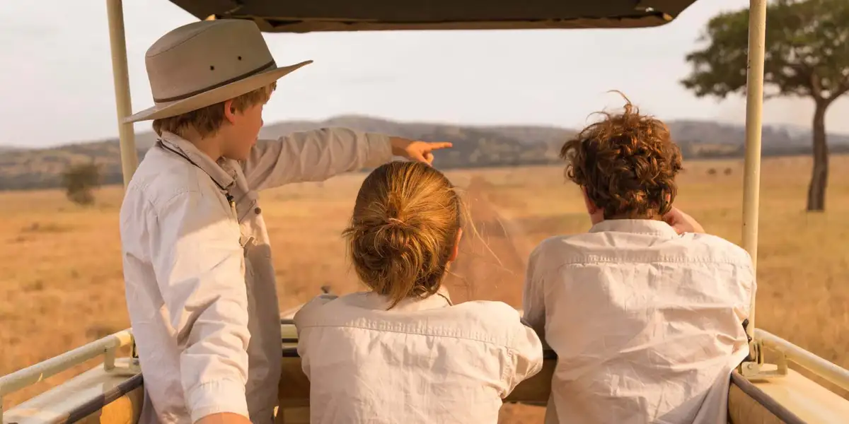 Family enjoying game drive in Serengeti – where to go for family safari in Africa