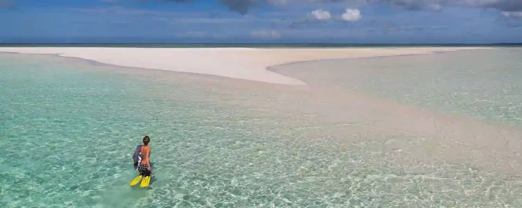 A scenic view of Pemba Island's coastline, showcasing the top things to do in Pemba Island, including snorkeling, exploring ancient ruins, and more.