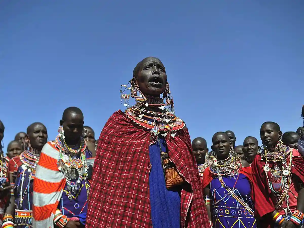 A group of Maasai women gather, showcasing empowerment within Maasai culture.