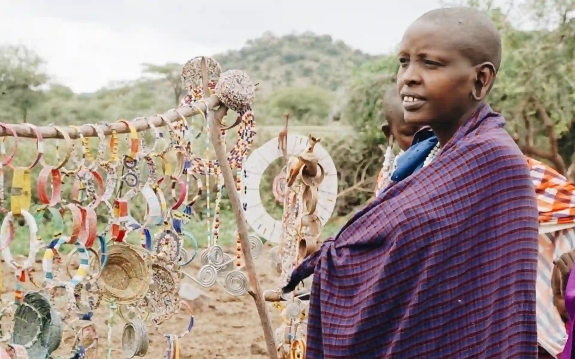 A colorful scene at the Maasai Market in Arusha, showcasing the rich culture of the Maasai Tribe during Tanzania Cultural Tours.