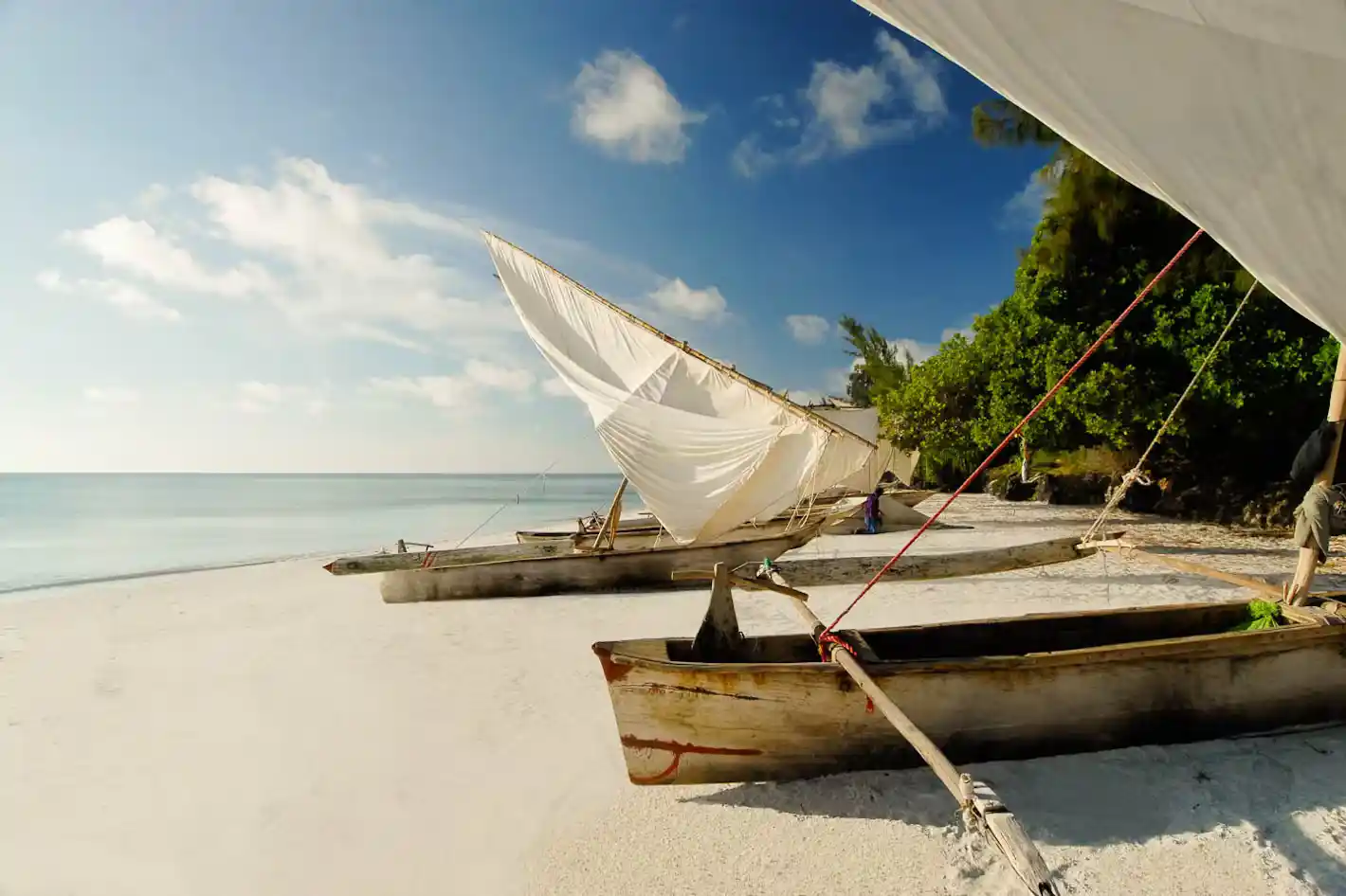 A serene beach scene on Pemba Island, Zanzibar, Tanzania, perfect for travel tips. #PembaIslandTravelTrips