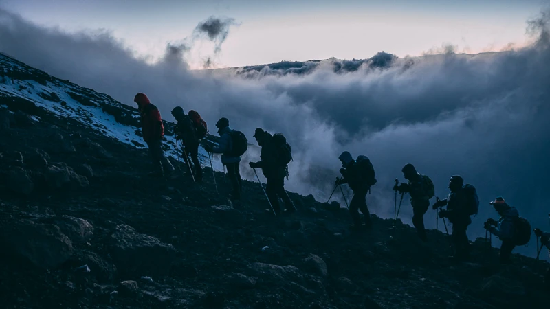 Sunset painting the sky behind Kilimanjaro Mountain, Keyword: Mount Kilimanjaro Facts