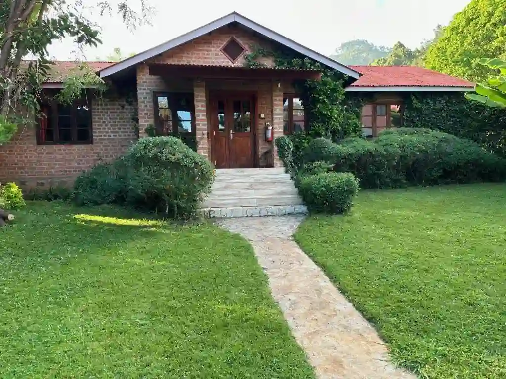 Experience the charm of Swiss Farm Cottage nestled amidst the verdant beauty of the Usambara Mountains, offering serene accommodations for a rejuvenating escape.