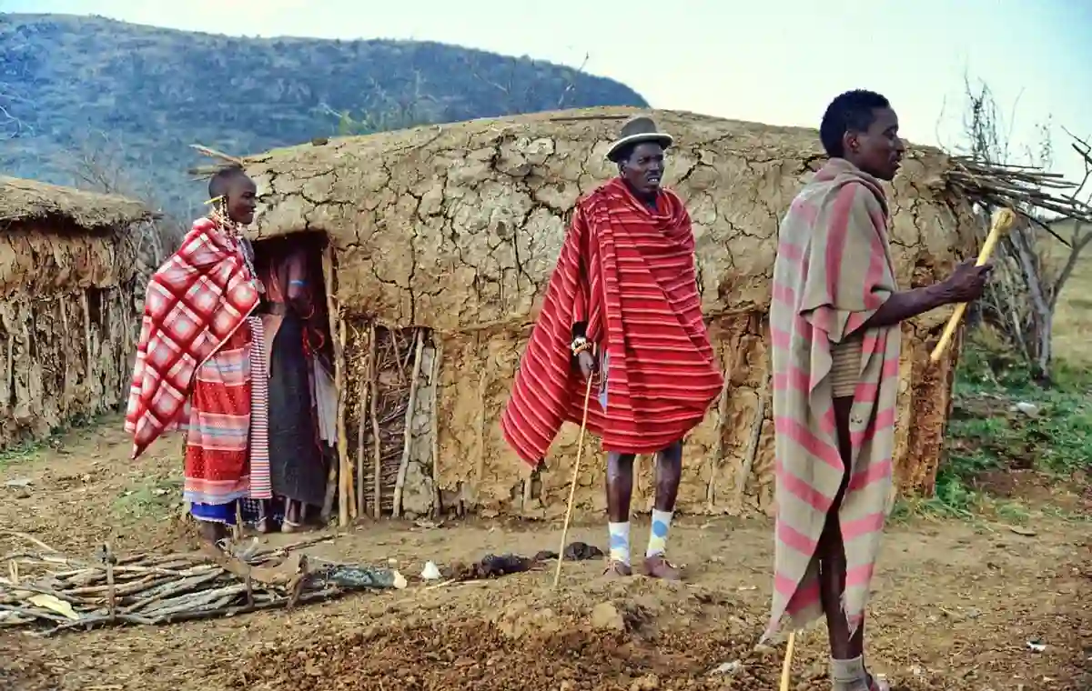 A group of Maasai people performing traditional rituals, embodying Maasai culture in Tanzania