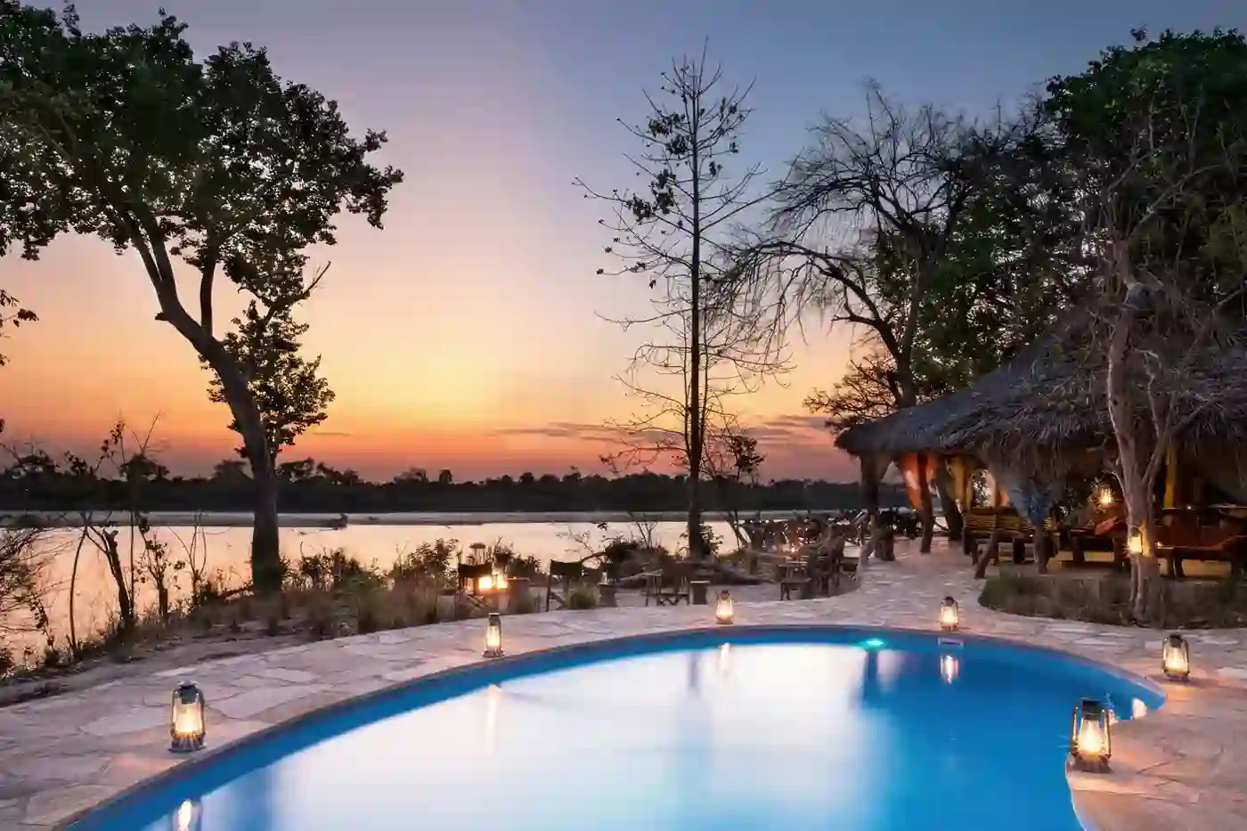 Udzungwa Mountains Accommodation: A scenic view of Udzungwa Falls Lodge nestled amidst lush greenery.