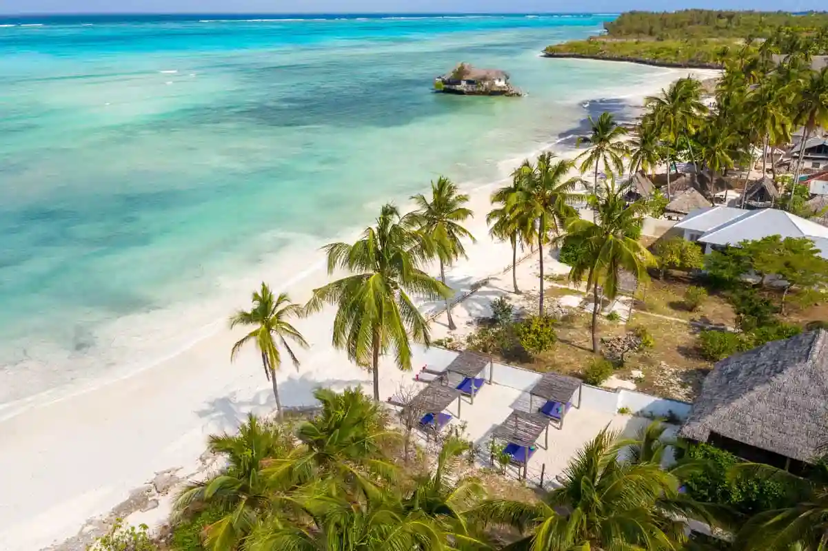 A breathtaking aerial view of beautiful Zanzibar Island, showcasing its pristine beaches and lush landscapes – ideal for planning your visit to the Tanzania coast.