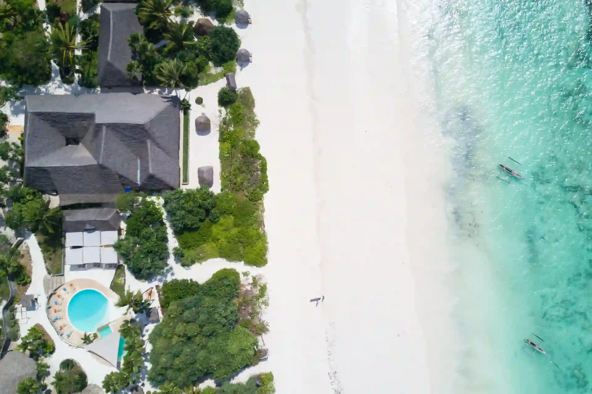 Aerial view of Zanzibar Pearl Boutique Hotel and Villa nestled along the picturesque coastline of Zanzibar Island, perfect for your Zanzibar Island Travel Guide.